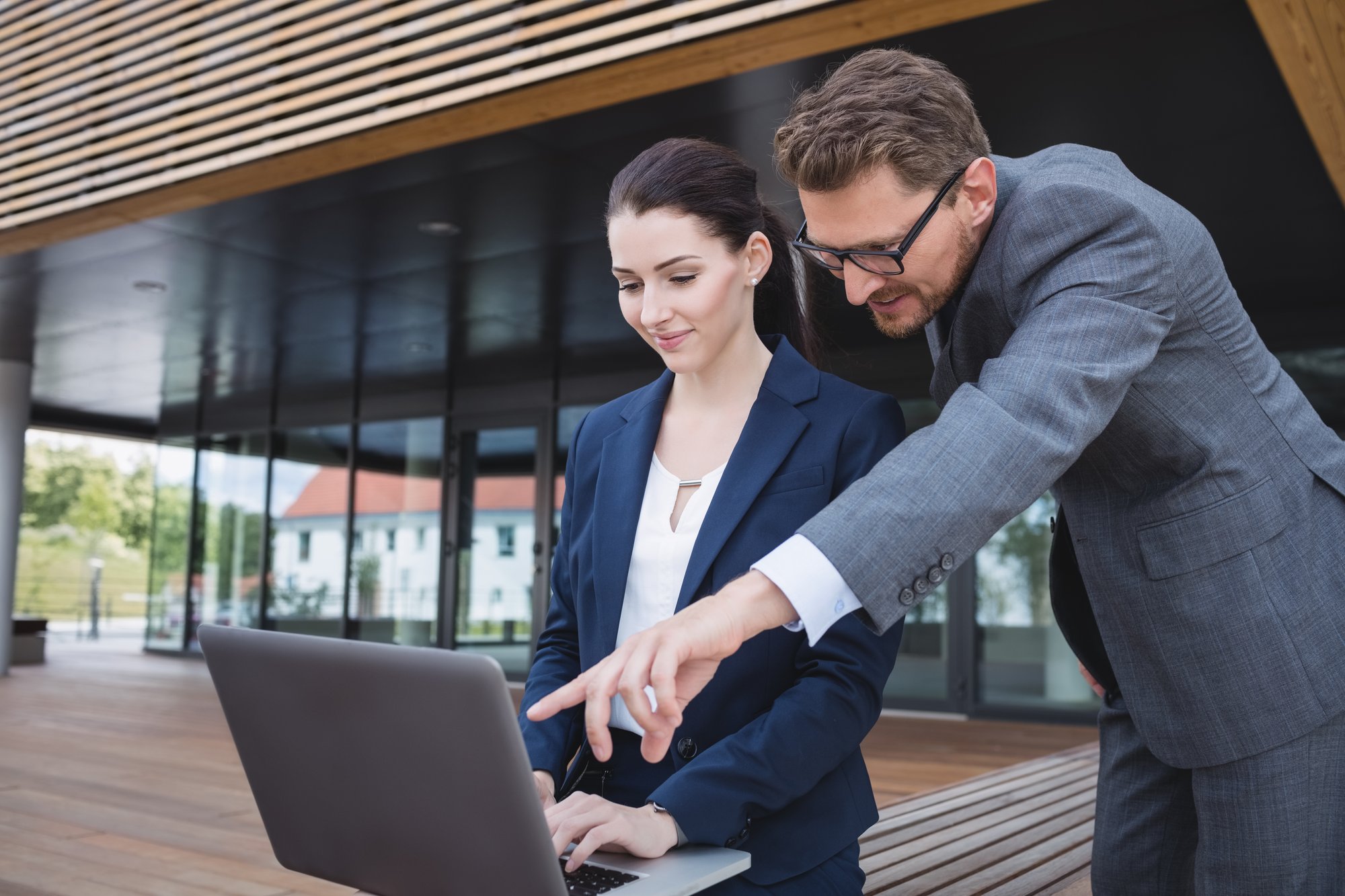 businesswoman-colleague-using-laptop